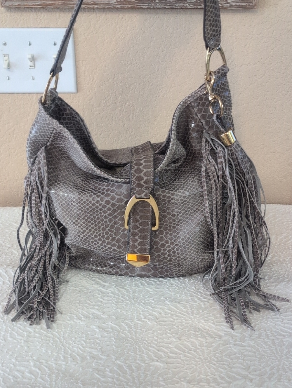 GILI Stirrup Leather Hobo Bag in Snake Print With Fringe